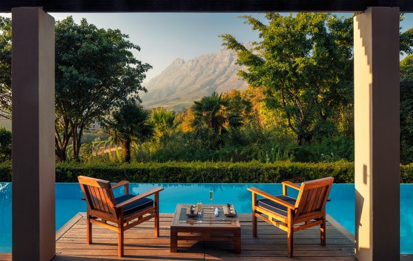 Presidential Lodge 2 terrace and 12 metre swimming pool overlooking Stellenbosch mountains at Delaire Graff Estate South Africa
