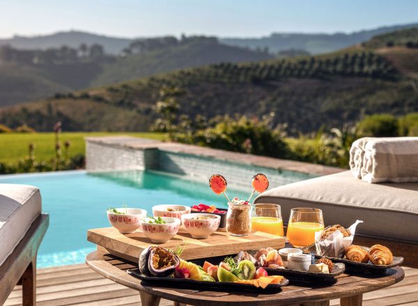 Breakfast served in-lodge on the terrace at Delaire Graff Estate