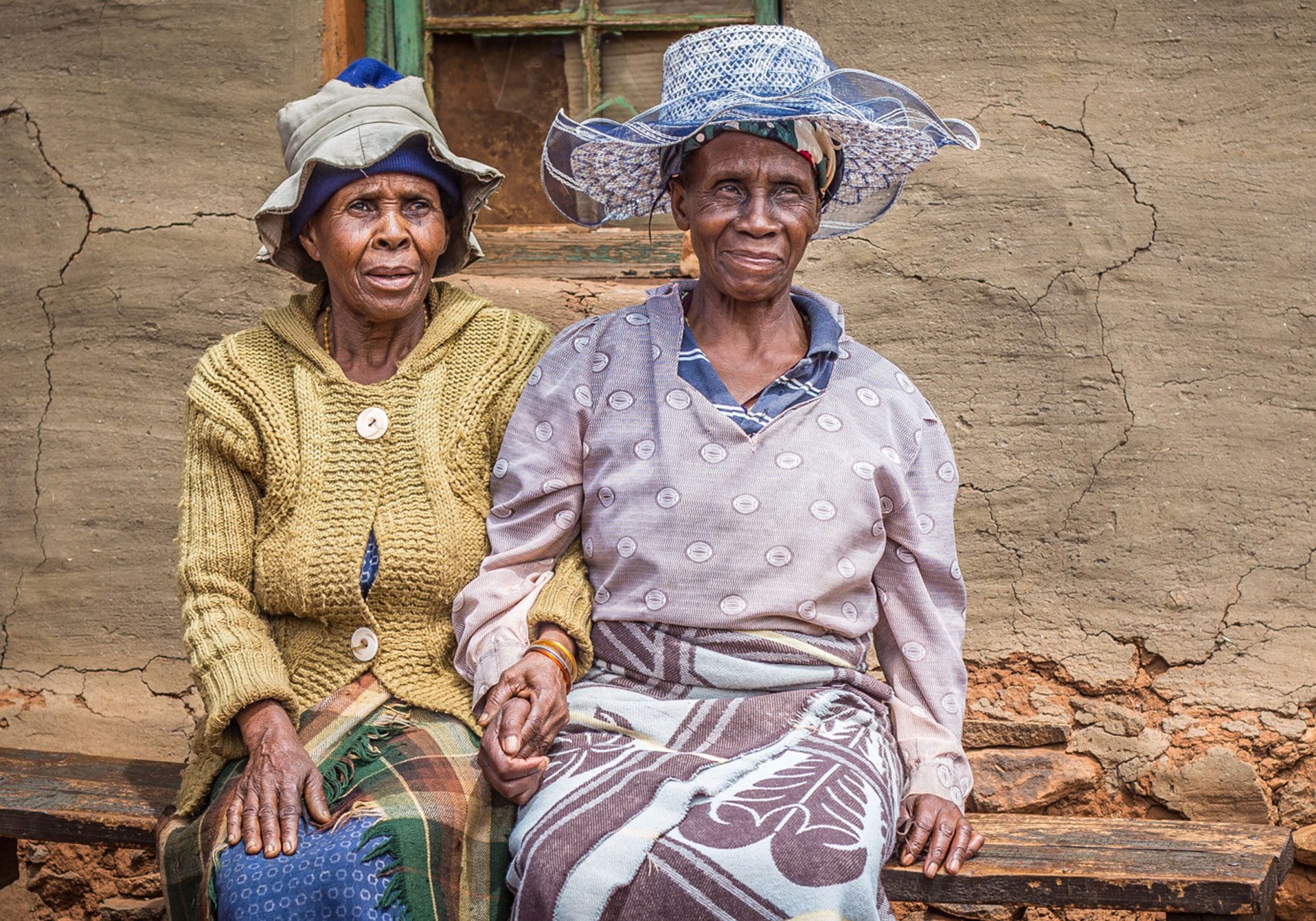 Two elderly ladies smiling at a Delaire Graff community centre in Lesotho