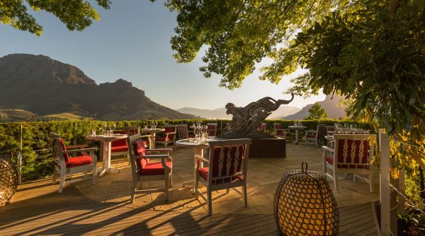 Delaire Graff Estate Restaurant terrace with a Dylan Lewis Cheetah sculpture