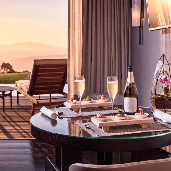 Delaire Graff Sparkling wine and canapes in a superior lodge at sunset