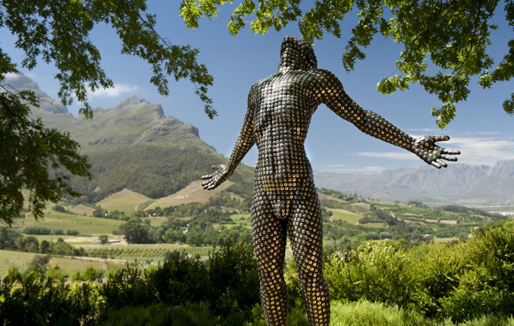 An Anton Smit statue of a human form in the gardens of Delaire Graff Estate