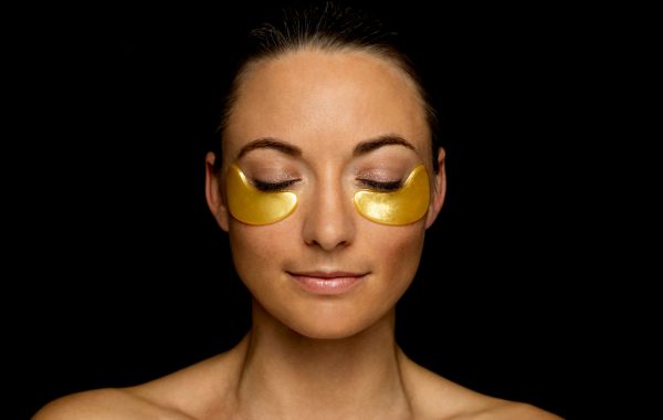 A lady enjoying a eye mask facial