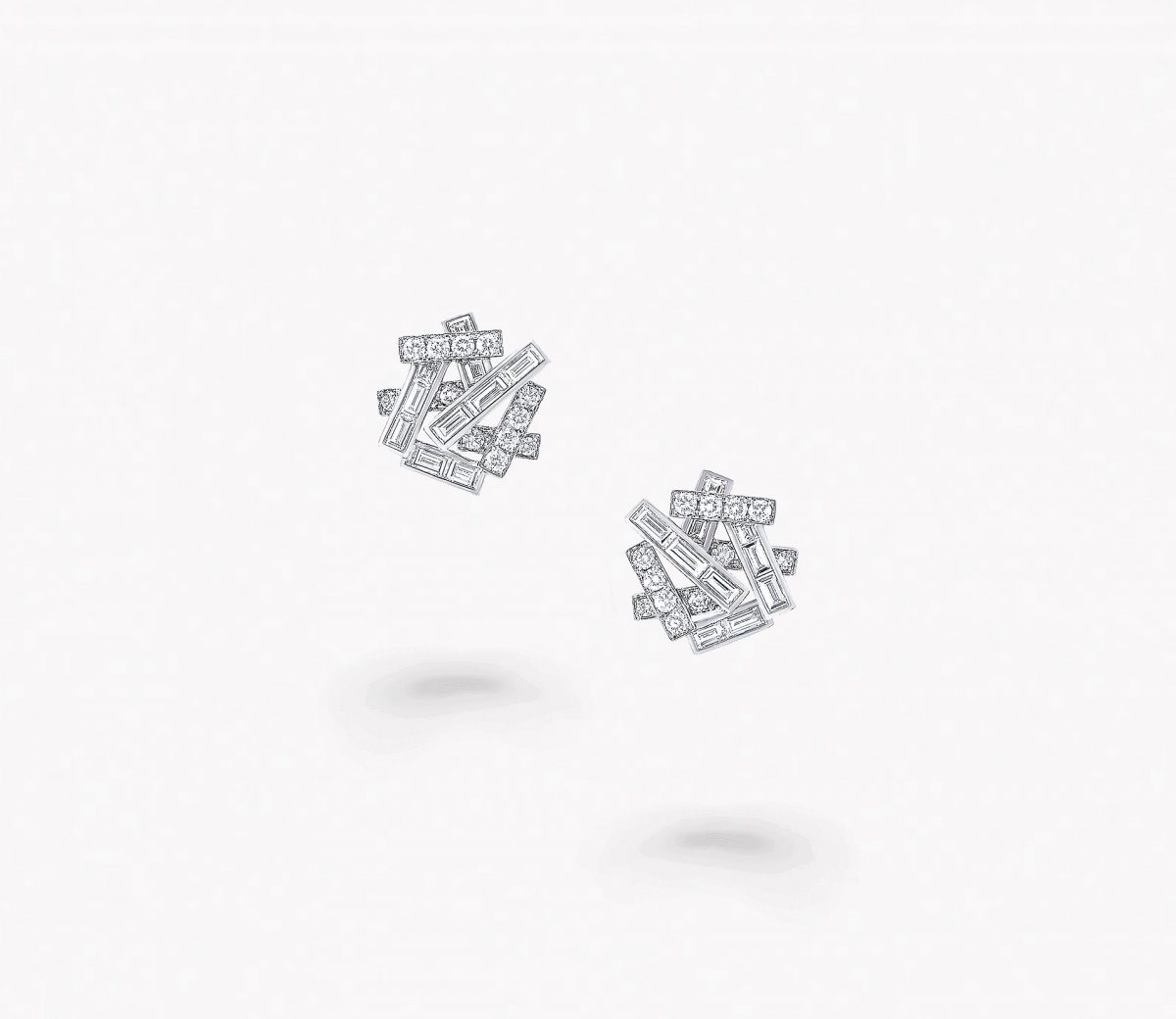 a pair of Graff Thread collection diamond stud earrings
