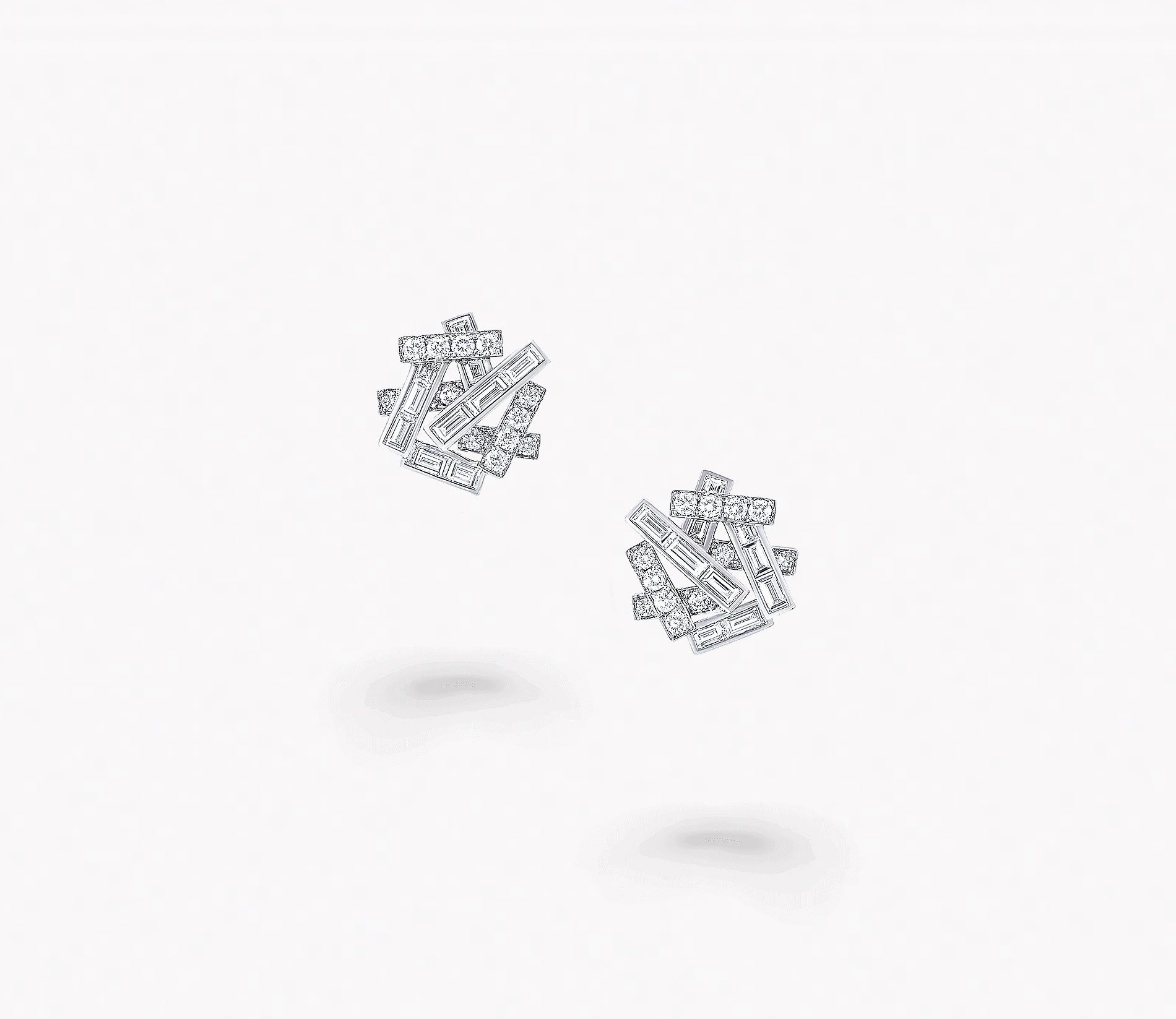 a pair of Graff Thread collection diamond stud earrings