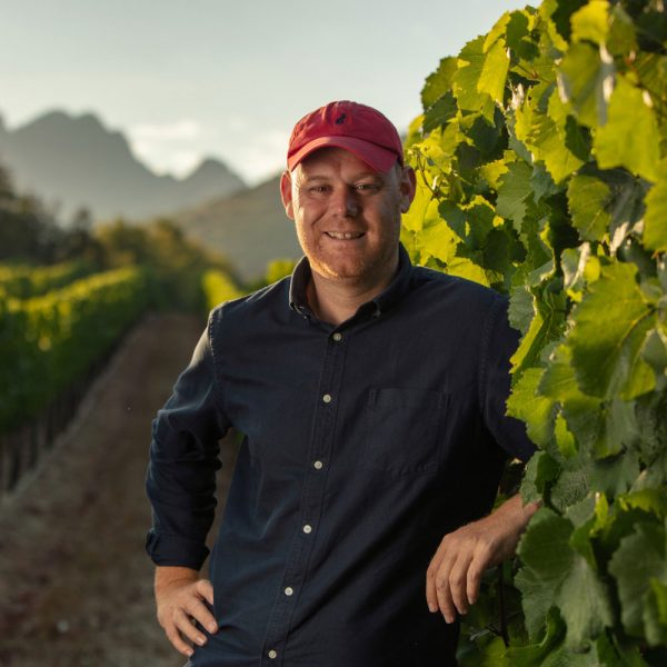 Morne Vrey smiling in the vineyards of Delaire Graff Estate