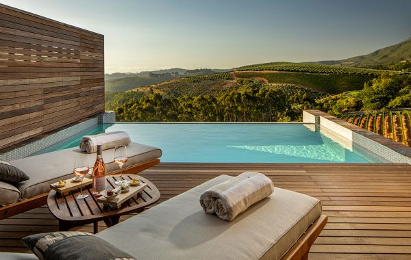 View of vineyards and Stellenbosch valley from a Superior Lodge balcony at Delaire Graff Estate