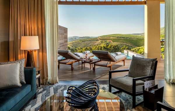 Superior Lodge living room leading onto private terrace with heated plunge pool