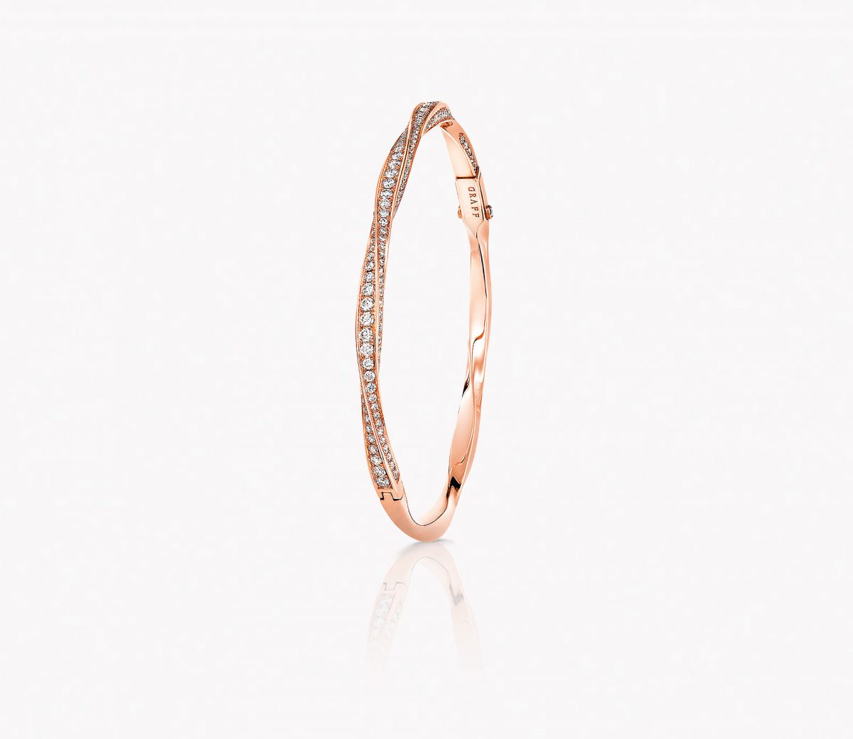 a Graff Spiral diamond pave bangle set in rose gold