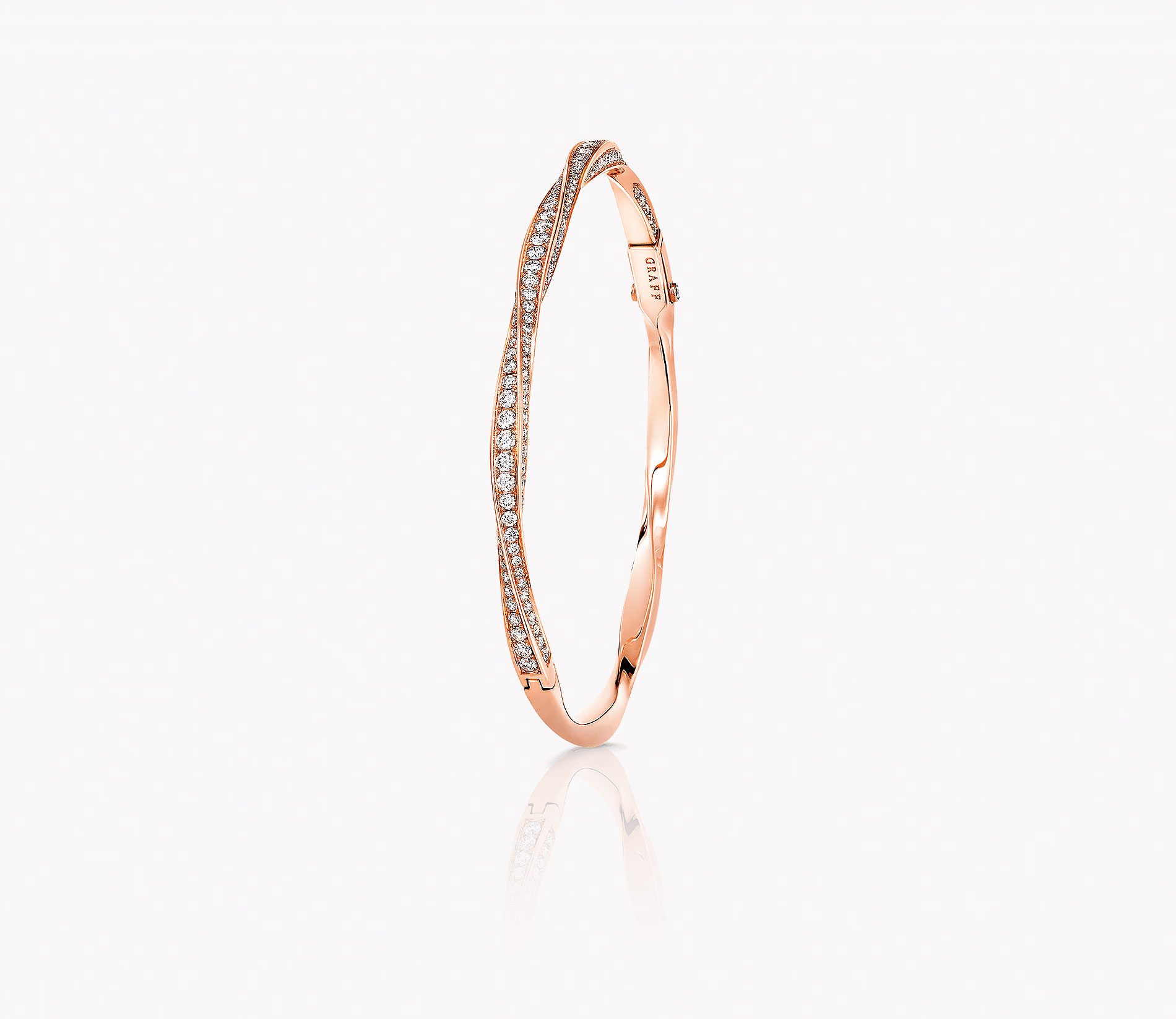a Graff Spiral diamond pave bangle set in rose gold
