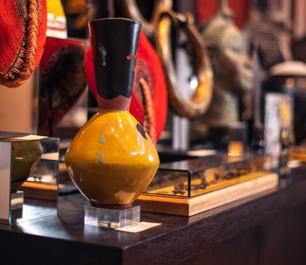 a handcrafted yellow tribal pot for sale at Africa Nova boutique Delaire Graff Estate