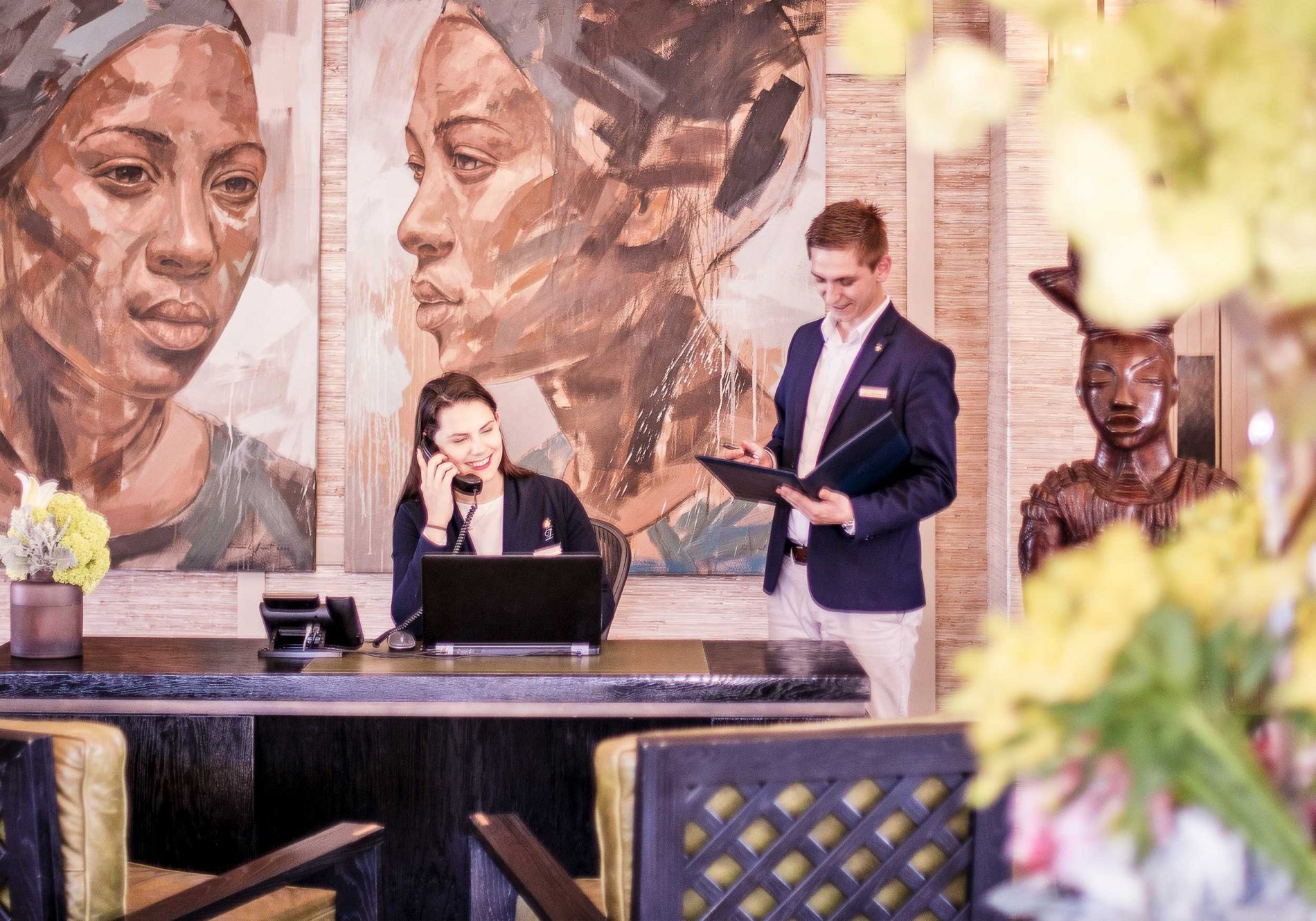 The Delaire Lodges & Spa reception team behind front desk